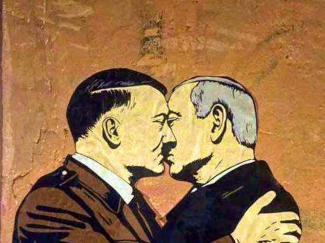 Street artist έφτιαξε γκράφιτι στη Ρώμη που απεικονίζει τον Νετανιάχου να φιλάει τον Χίτλερ